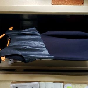 BCBGMAXAZRIA Large Black vegan leather side cut out Cocktail Dress.